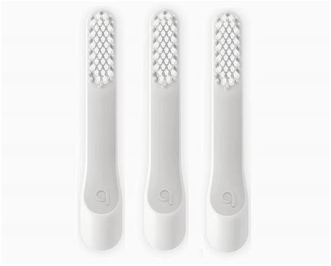 The Tongue scraper on back to help freshen breath. . Quip electric toothbrush head for electric brush 3 packs